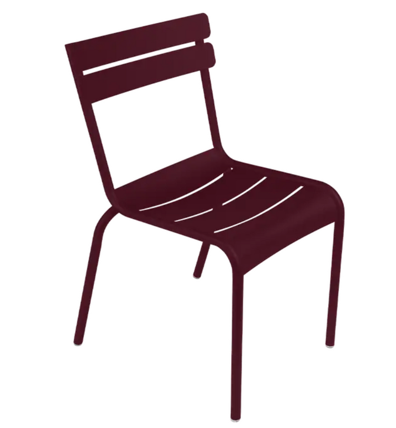 Load image into Gallery viewer, Black Fermob Luxembourg armchair with metal frame, stackable design, suitable for outdoor or restaurant seating.

