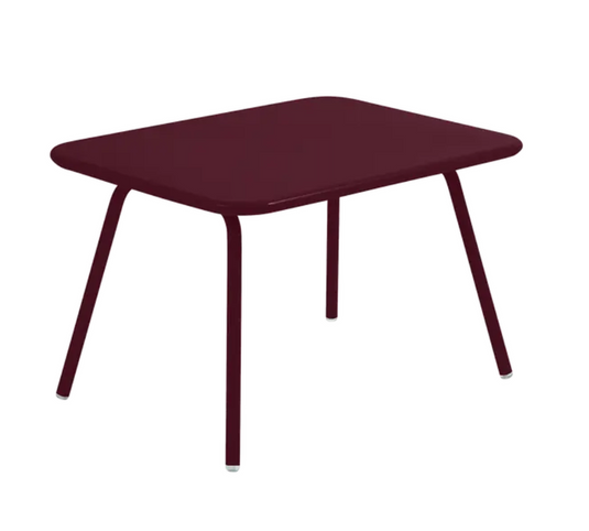 Black Fermob Luxembourg kids' table with a corner design, ideal for children's play and activities in a modern restaurant or home setting.