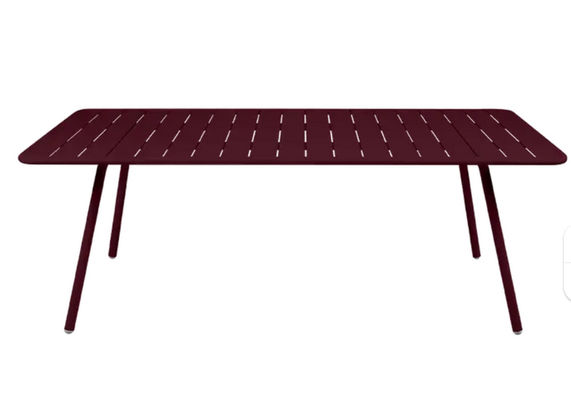 Load image into Gallery viewer, Black Fermob Luxembourg outdoor table, 210x100 cm, made of durable material, ideal for outdoor dining and patio use.
