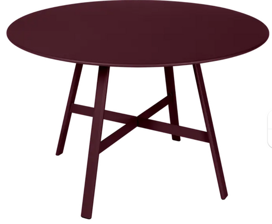 Fermob SO'O Oval Oak Table with 117cm diameter, black cherry finish, suitable for restaurant or hotel settings.