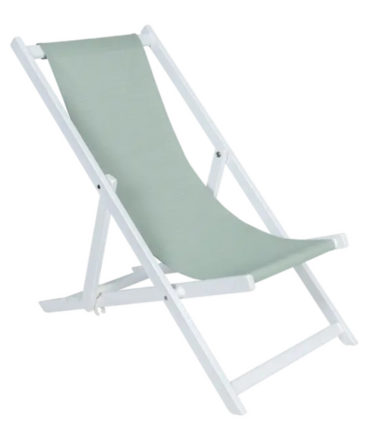 Fermob Blanc Sauge ALPINA folding deck chair outdoors, lightweight and foldable for easy outdoor seating.