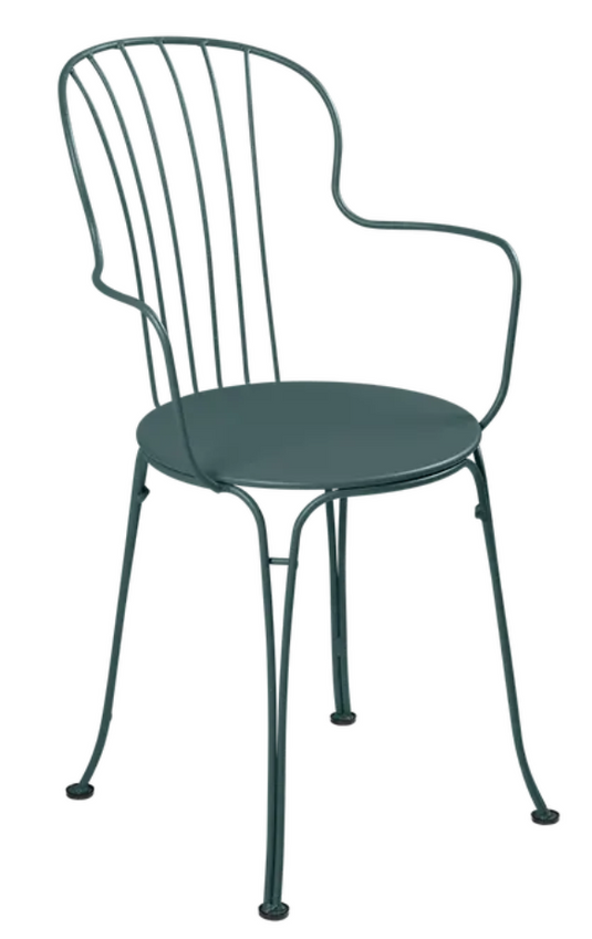 Fermob OPÉRA+ outdoor metal armchair in stormy grey with a sleek, modern design suitable for garden or patio seating.
