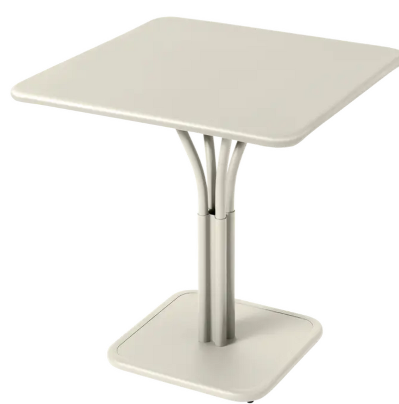 Load image into Gallery viewer, Fermob Luxembourg metal outdoor table with a solid aluminum top, 71x71 cm, suitable for patio or restaurant settings.
