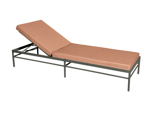 Fermob Rivage luxury metal sunlounger with cactus peach cushion, outdoor lounge chair for relaxing in the garden or patio.