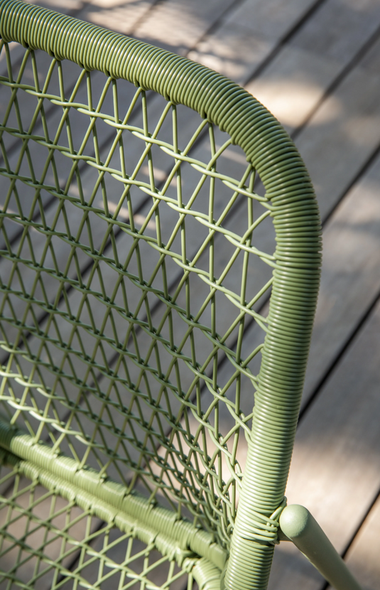 Fermob Sixties Low Armchair woven lounge chair with a stylish design, ideal for outdoor restaurant or patio seating.