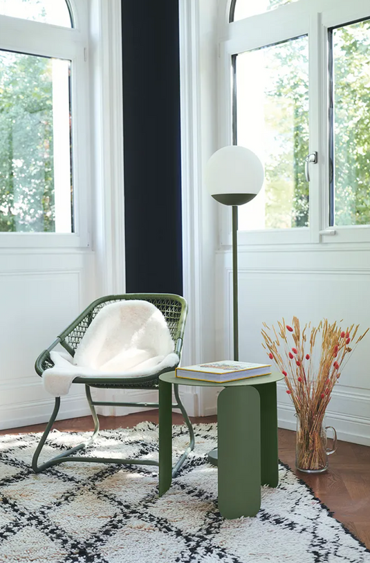 Cactus white Fermob Sixties Low Armchair woven lounge chair with a stylish, modern design for restaurant or home use.