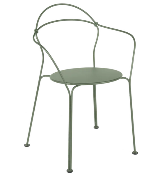 Fermob Airloop Lounge Chair with a cactus-patterned cushion, outdoor metal furniture for stylish relaxation.