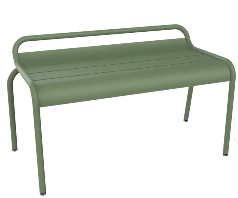 Load image into Gallery viewer, Fermob Luxembourg stackable outdoor bench, 90 cm, with metal structure and cactus green finish, shown from side on hall.
