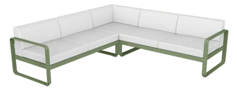 Load image into Gallery viewer, Off-white Fermob Bellevie outdoor sofa composition with modular seats and cushions, set against a cactus background.
