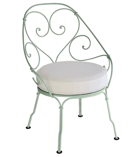 Off-white Fermob Cabriolet outdoor armchair with metal frame, cactus design, suitable for garden or patio seating.