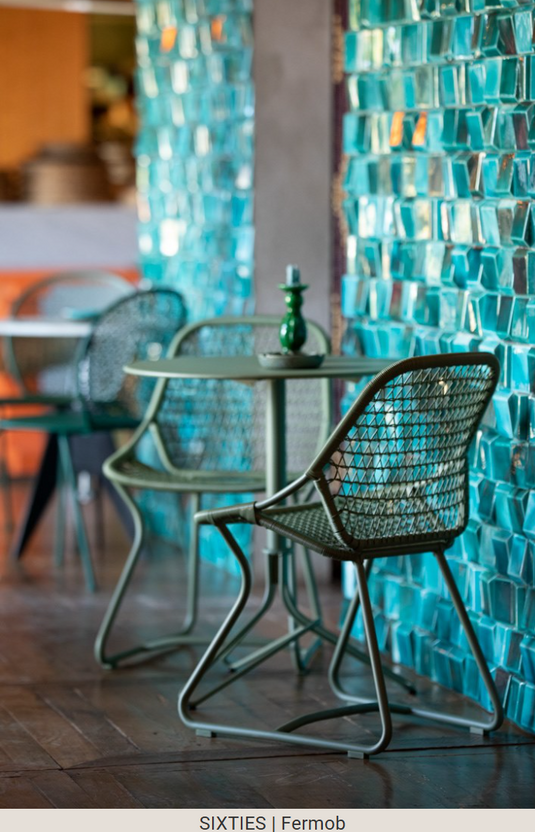 Stackable Fermob Sixties outdoor chair with cactus green finish, suitable for restaurant and hospitality outdoor seating in Ireland.