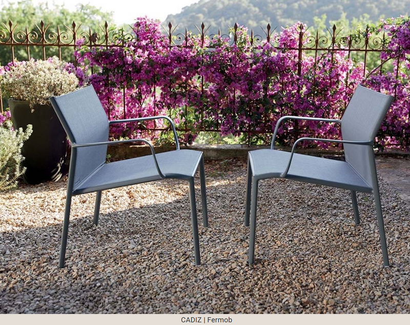 Load image into Gallery viewer, Fermob Cadiz Low Armchair outdoor aluminum chair with technical fabric seat, modern design for patio or garden use.
