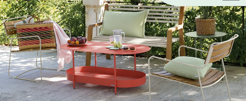 Load image into Gallery viewer, Orange Salsa low table by Fermob, measuring 113 x 58cm, with a sleek modern design and smooth surface.
