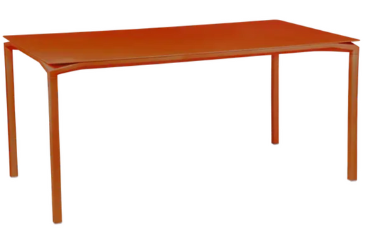 Fermob CALVI rectangular kitchen table measuring 160x80 cm, six-seater with orange finish and modern design.