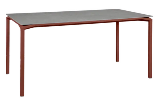 Fermob CALVI Creta mineral dining table, 160x80 cm, six-seater with Candied Orange Grey color, modern outdoor table.