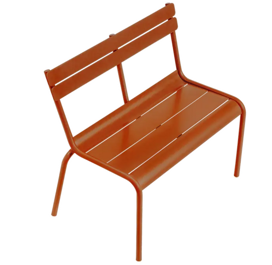 Fermob Luxembourg Kid Bench featuring a vibrant candied orange color, suitable for kids' restaurant or corner furniture.