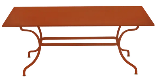 Fermob Romane Table in candied orange finish, 180 x 100 cm, designed for up to 8 guests, outdoor dining furniture.