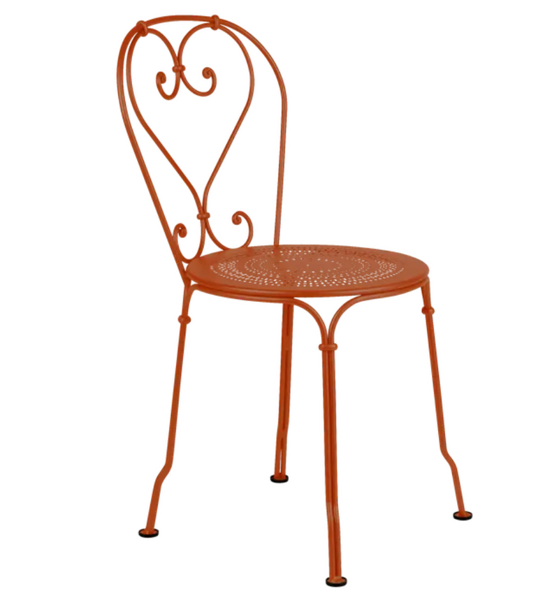 Load image into Gallery viewer, Candied orange Fermob 1900 outdoor chair with curved metal frame and slatted seat, perfect for garden or patio seating.
