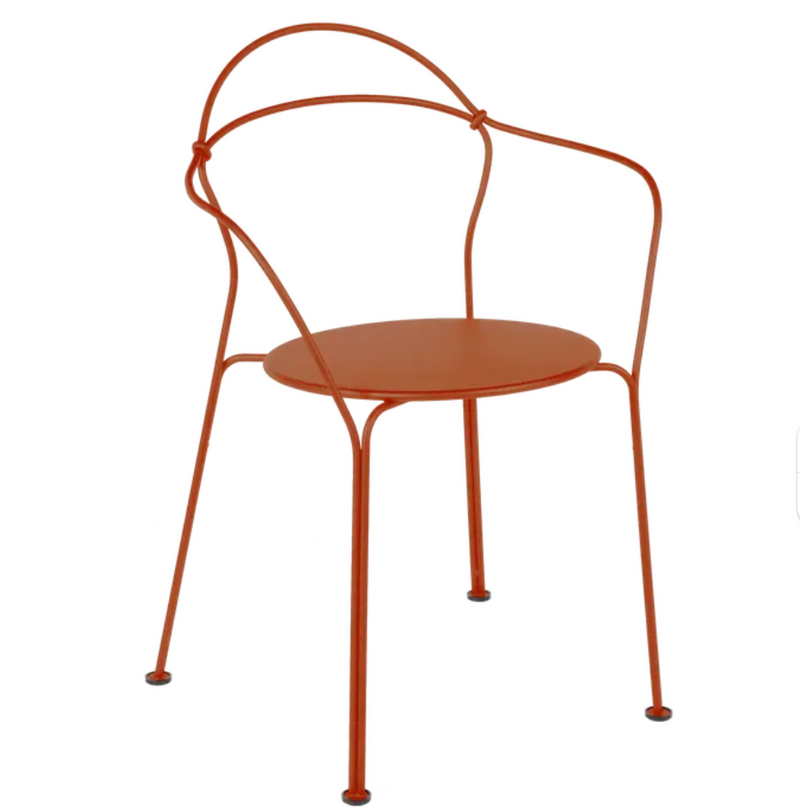 Load image into Gallery viewer, Fermob Airloop Lounge Chair with a vibrant candied orange metal finish, outdoor furniture armchair with modern design
