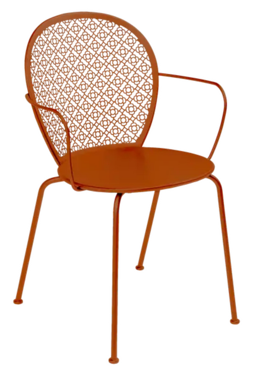 Orange Fermob Lorette outdoor metal armchair with curved armrests and slatted seat, suitable for garden or patio use.