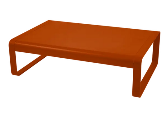 Fermob Bellevie low lounge table in metal, 105x75 cm, outdoor coffee table with a vibrant candied orange finish.
