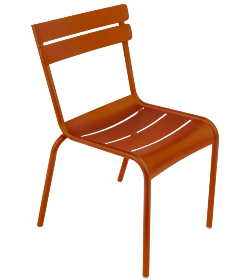 Load image into Gallery viewer, Orange Fermob Luxembourg armchair made of metal, stackable design, ideal for outdoor or restaurant seating.
