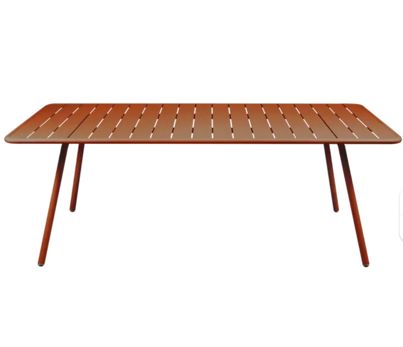 Load image into Gallery viewer, Outdoor Fermob Luxembourg Table in Candied Orange, 207x100 cm, showcasing a vibrant, weather-resistant table for outdoor dining.
