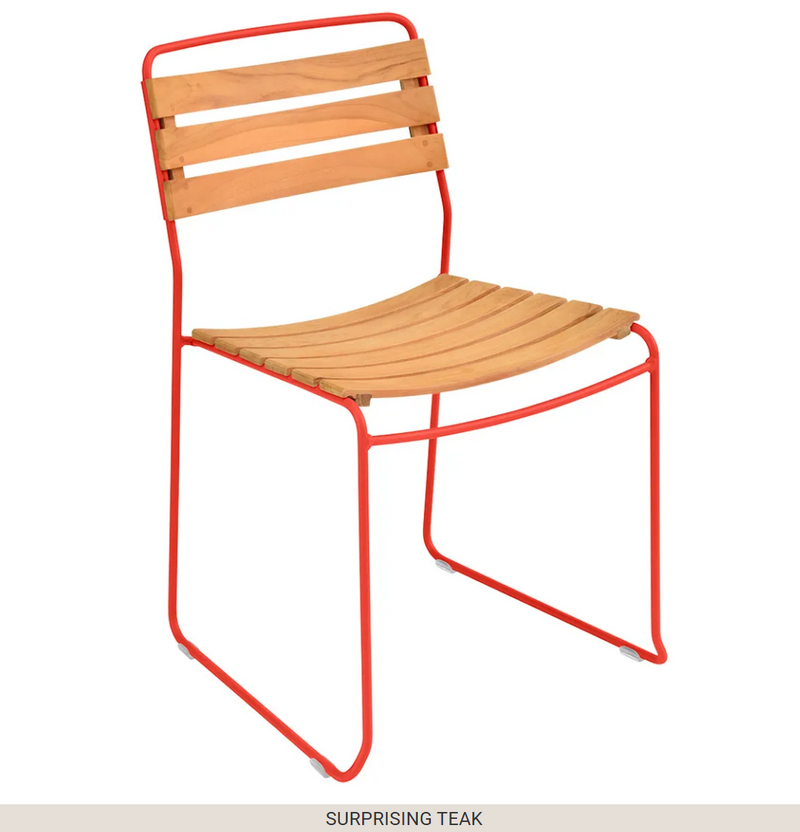Load image into Gallery viewer, White Fermob metal outdoor chair with a candied orange cushion, part of the Surprising Teak Chair collection.
