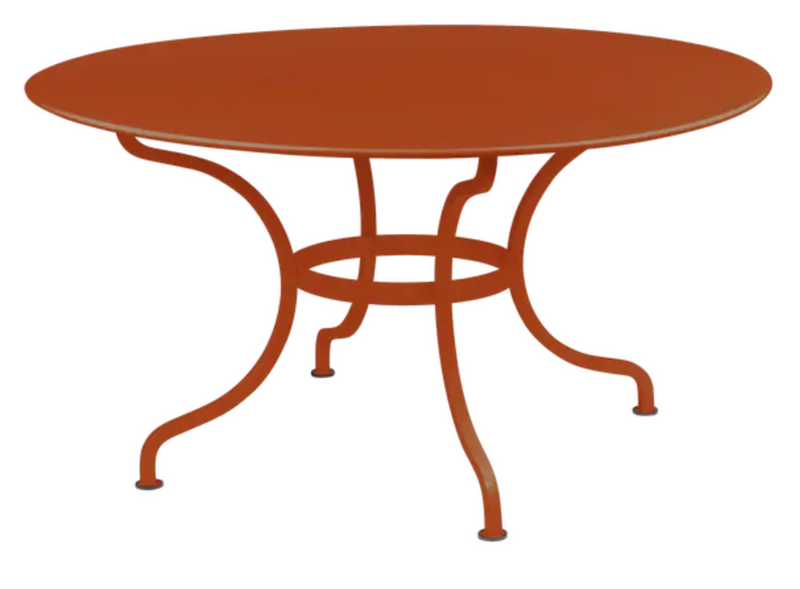 Load image into Gallery viewer, Fermob Romane round table with a 137cm diameter, suitable for up to 8 guests, in a vibrant candied orange color.
