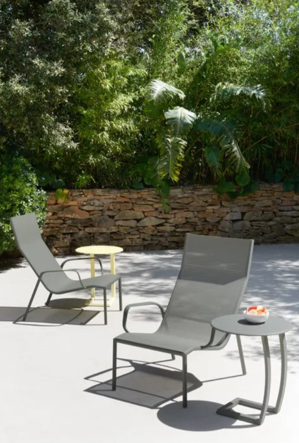 Fermob Cadiz Lounge Armchair with a modern design, featuring a sleek frame and comfortable seating for relaxing indoors or outdoors.