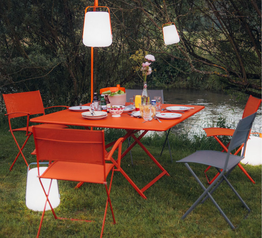 Fermob Caractère foldable outdoor table, 128x128 cm, eight-seater with sleek design and sturdy metal frame, ideal for outdoor dining.