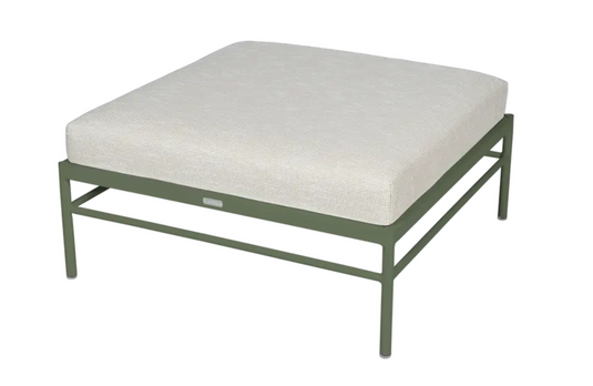 Fermob Rivage outdoor ottoman with metal frame and woven wicker surface, versatile lounge footstool for patio or garden seating.