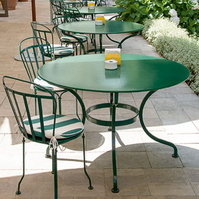 Load image into Gallery viewer, Fermob Romane round table in Ceadr Green, 137cm diameter, seating up to 8 guests, outdoor patio furniture for dining or gatherings.
