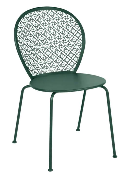 Cedar green Fermob Lorette metal outdoor chair with a curved backrest and armrests, suitable for patio or garden use.