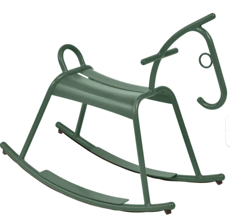 Load image into Gallery viewer, Cedar green and white Fermob ADADA rocking horse toy for kids' restaurant waiting area, made of durable wood for children.
