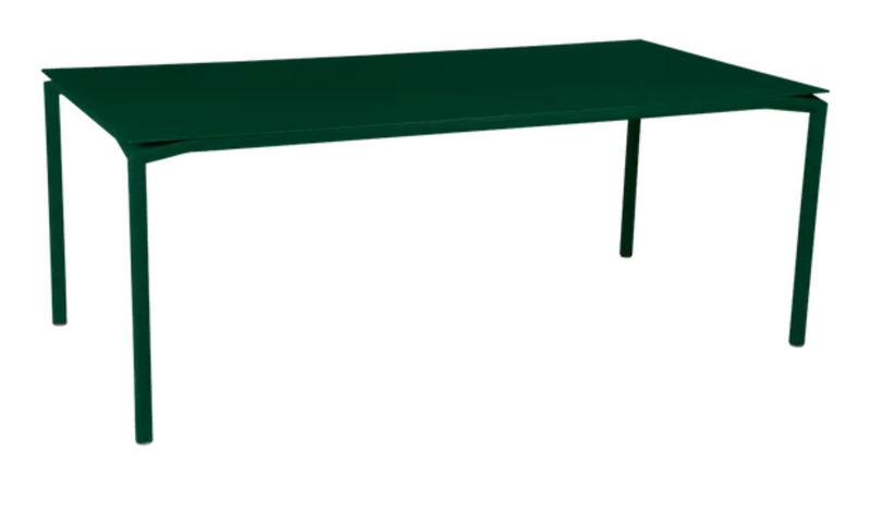 Load image into Gallery viewer, Fermob Calvi outdoor rectangular dining table in cedar green, 195 x 95 cm, suitable for outdoor and indoor use.
