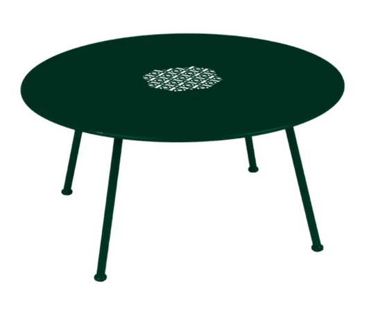 Fermob Lorette low coffee table in cedar green metal with white accents, 80cm diameter, outdoor fire-resistant design.