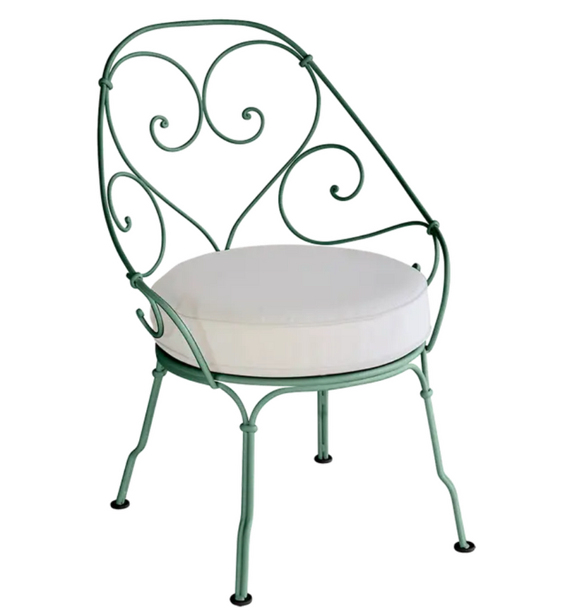 Load image into Gallery viewer, Cedar green Fermob Cabriolet outdoor armchair with off-white cushions, metal frame, stylish patio furniture for outdoor spaces.
