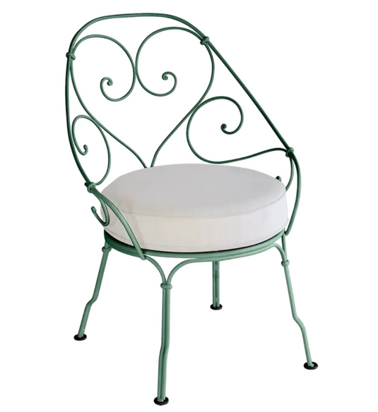Cedar green and off-white Fermob Cabriolet outdoor armchair with metal frame and armrests, ideal for garden or patio seating.