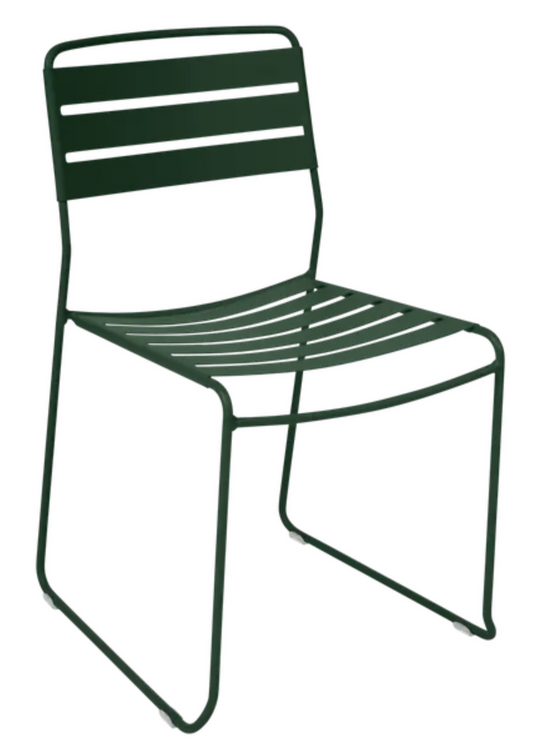 Cedar green Fermob Surprising outdoor chair with a modern, curved design, ideal for restaurant or patio seating.
