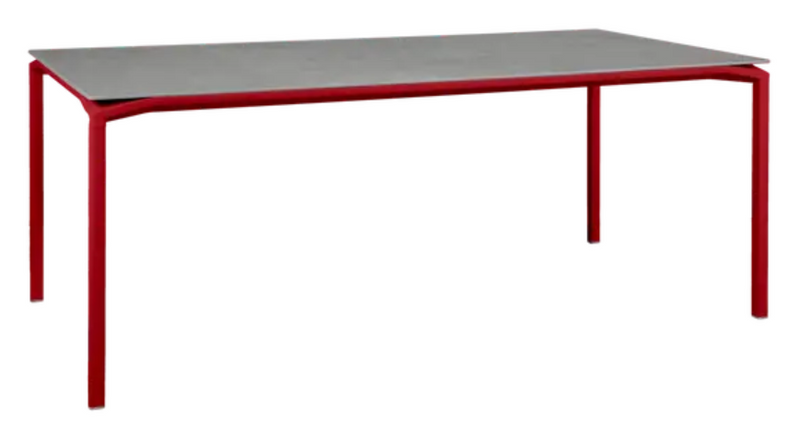 Load image into Gallery viewer, Fermob CALVI Kreta mineral dining table, 195x95 cm, eight-seater with vibrant chili-colored tabletop and sturdy metal legs.
