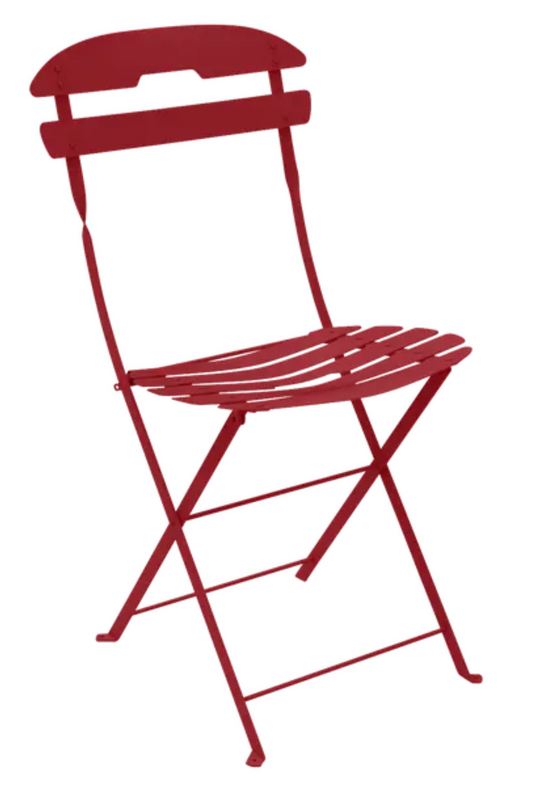 Fermob LA MÔME Chai folding chair in vibrant chili red, compact and lightweight patio furniture, foldable for easy storage.
