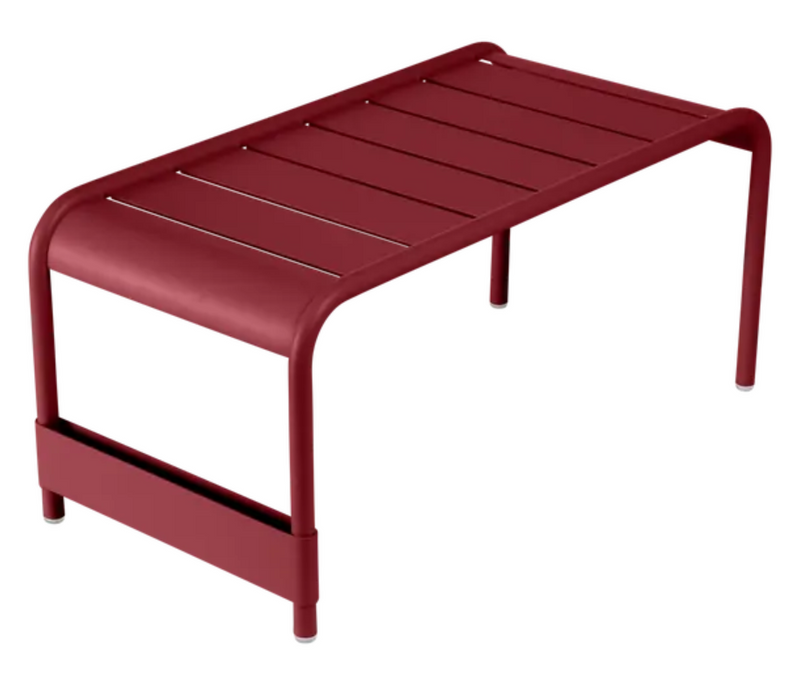 Load image into Gallery viewer, Fermob Luxembourg large low table or bench, 86x44 inches, with a vibrant orange finish, ideal for outdoor seating or decor.
