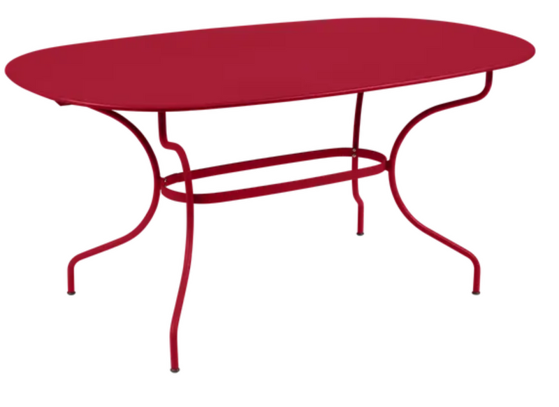 Load image into Gallery viewer, Fermob OPÉRA+ oval metal outdoor table, 160x90 cm, six-seater, with a vibrant red finish and sleek design for patio or garden.
