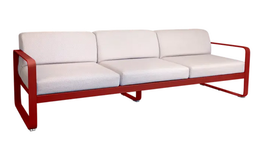 Fermob Bellevie 3-seater outdoor sofa with metal frame, featuring vibrant chili pearl cushions for stylish outdoor seating.