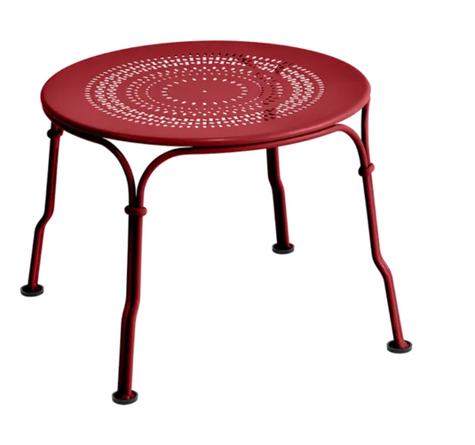 Fermob 1900 Low Table with 45 cm diameter in vibrant red metal, showcasing a round modern design suitable for outdoor or indoor use.