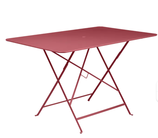 Fermob foldable bistro table measuring 117x77 cm with outdoor metal design, suitable for compact dining or outdoor use