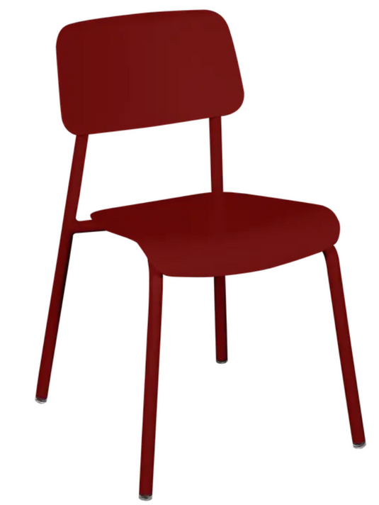 Fermob outdoor Chilli Studie Chair with a sleek design, featuring a colorful, weather-resistant seat and sturdy metal frame.