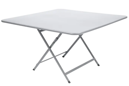 White Fermob Caractère foldable outdoor table, 128x128 cm, eight-seater, ideal for outdoor dining and gatherings.