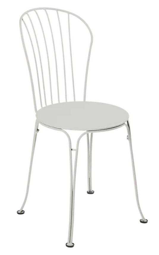 Clay grey Fermob OPÉRA+ metal outdoor chair featuring a sleek design, ideal for patio or restaurant seating.